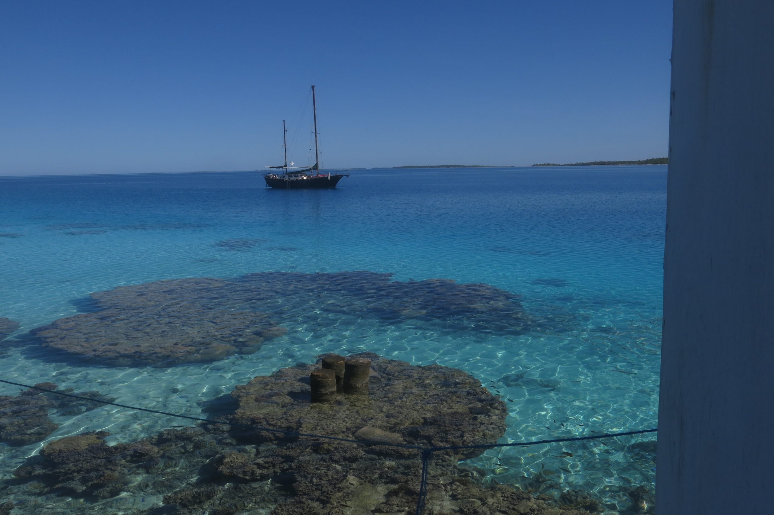 Karaka anchored above a reef