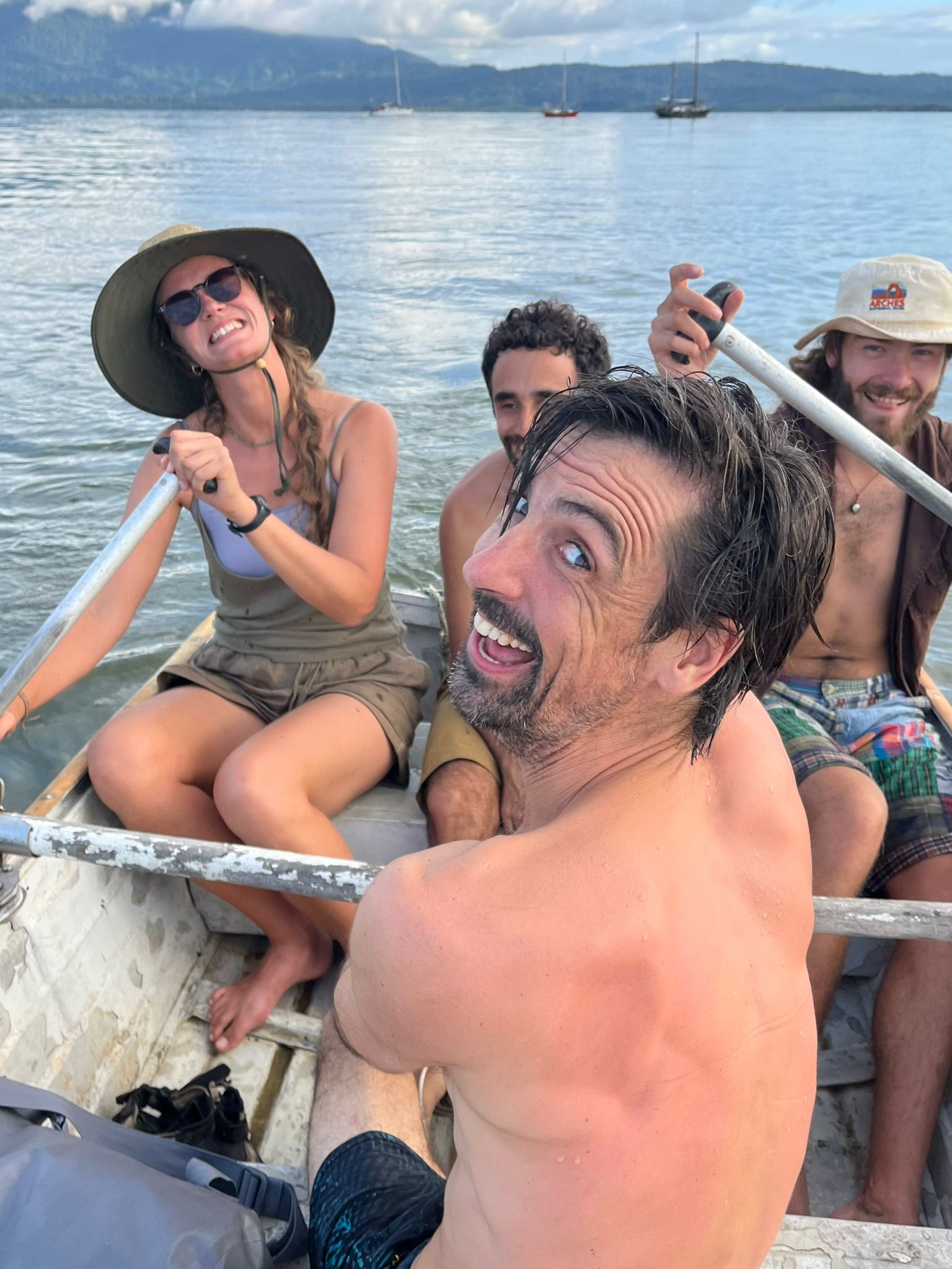 Crew sharing a dinghy ride